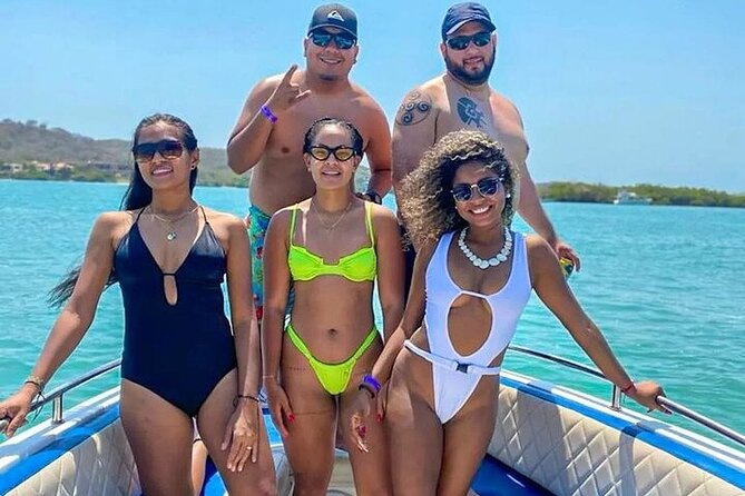 5 Island Tour with Lunch Snorkel in Cartagena Rosario Island - Snorkeling on Islas de Rosario: coral water and a sunken airplane
