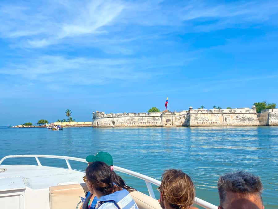 Cartagena: 5-Island Trip by Boat with Lunch and Snorkeling - Rosario Islands snorkeling: clear water, coral, and a surreal plane moment