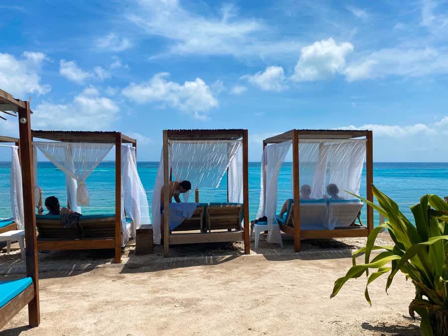 Cartagena: 5-Island Trip by Boat with Lunch and Snorkeling - Isla de Cholon: photo stops, seafood tasting, and a party-ish mood