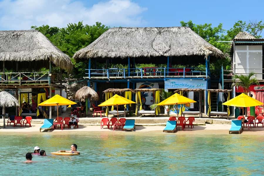 Cartagena: Day Tour to Tierra Bomba Island - Your Day Timeline: From Welcome Drink to Sunset