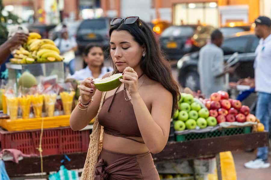 Cartagena: Guided Street Food Tour with Tastings - Finding the orange umbrella at Plaza Cervantes