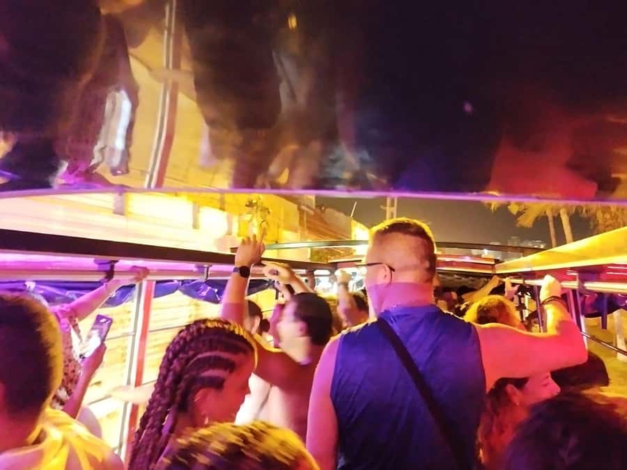 Cartagena: Party on a typical bus crossing the city - Bay views first: Bocagrande, Laguito, and Castillogrande from the bus