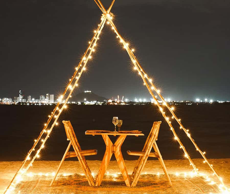 Fenix Beach Island Dinner - Arrival at Fenix Beach: bonfire, sand mandalas, and live music