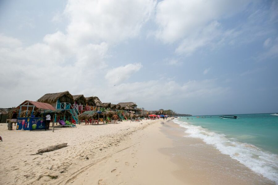 Playa Blanca Full-Day Trip from Cartagena - Leaving Cartagena: the Manga and Mamonal ride that sets the stage