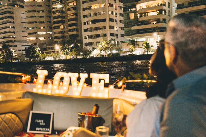 Romantic Date Night in the Bay of Cartagena - Second hour at Muelle de los Pegasos: champagne, roses, and bay lights