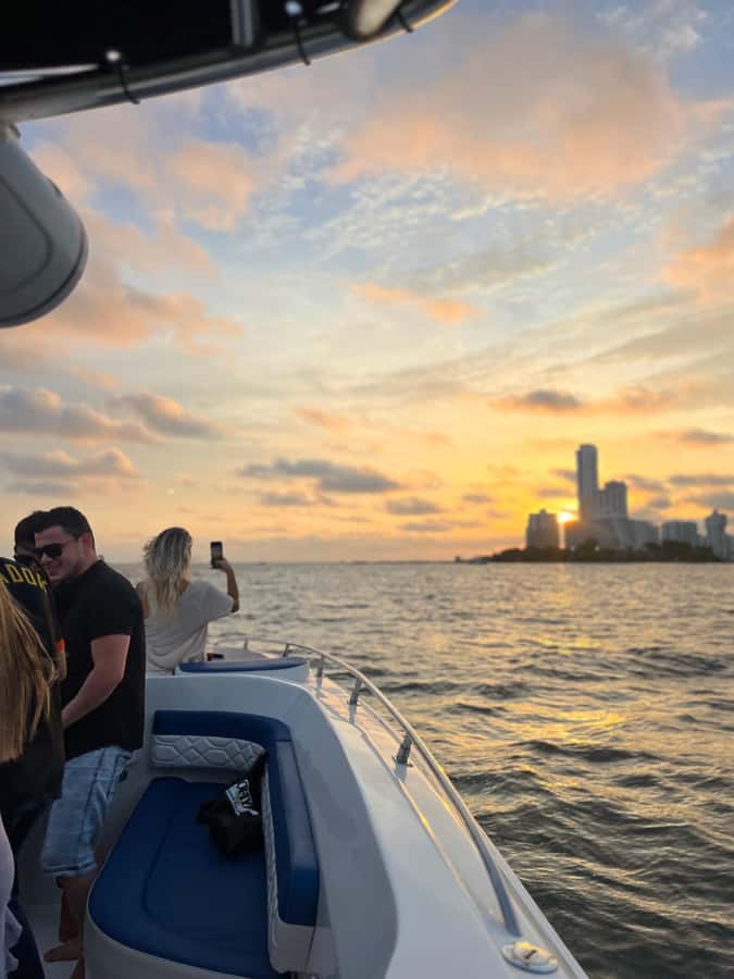 Sunset Party open bar on the bay while sharing with locals - Open bar flow: drinks, games, and what to pace yourself on
