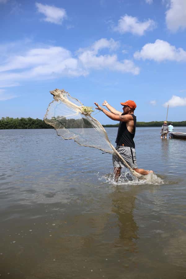 Typical lunch on beach, mangrove tour & fishing with natives - Fisherman Island in the middle of mangroves: why the visit matters